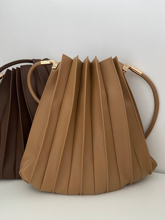 Side accordion bag