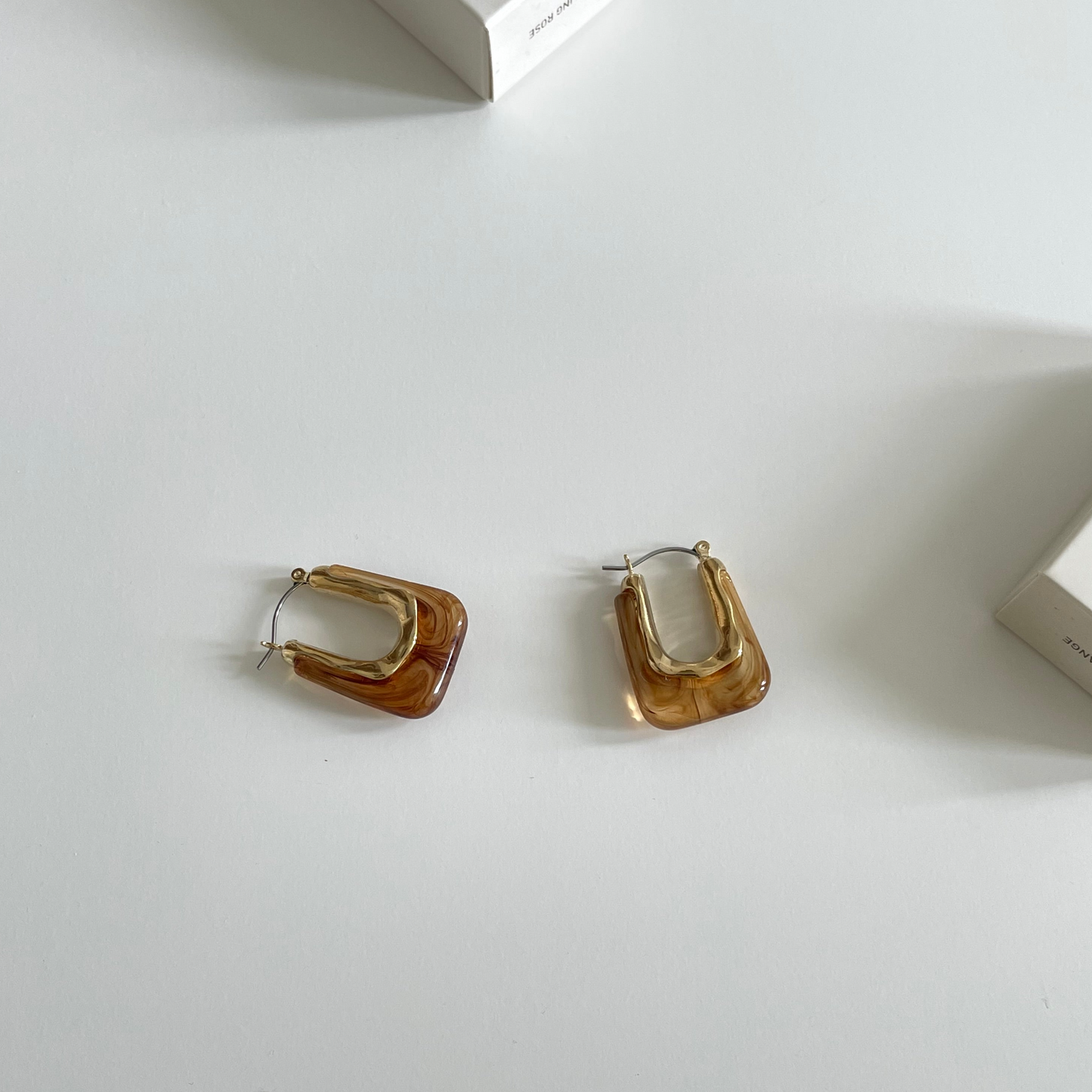 Brown U-shaped earrings