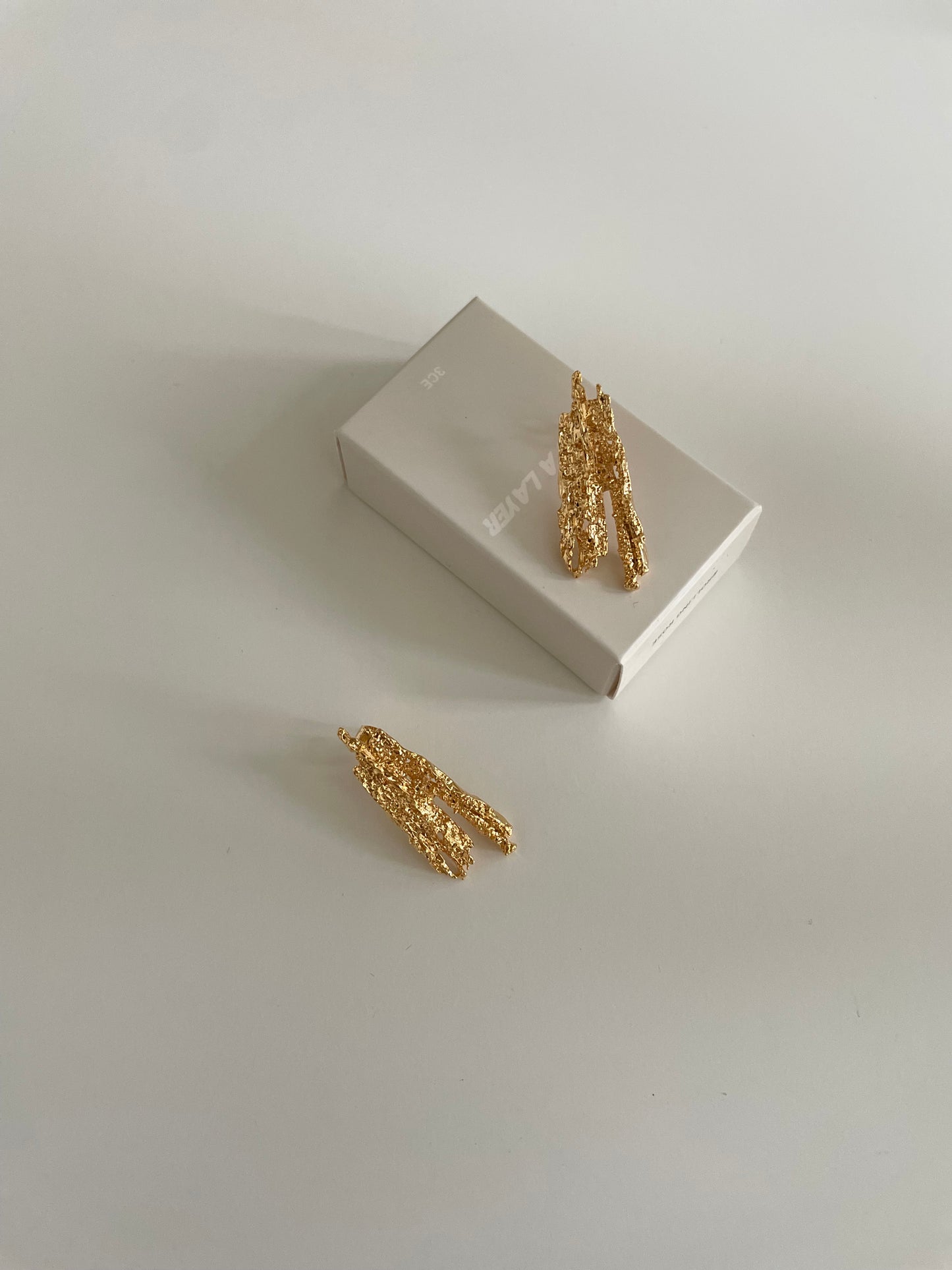 Gold tree branch earrings